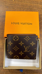 Louis Vuitton Multiple Wallet in brown Monogram coated canvas with credit card slots