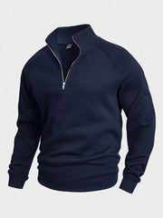 Men's navy blue half-zip sweatshirt with ribbed cuffs and metal zipper