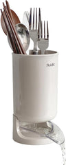 "Beige Carrotez self-draining utensil holder on kitchen counter"