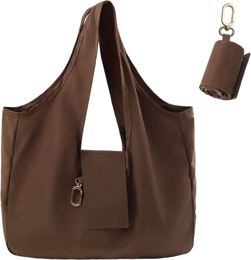 Mini keychain tote bag in vegan leather with gold accents, foldable reusable shopping bag for daily carry and travel
