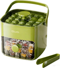 Green compact press-type ice cube tray with lid, storage bin and tongs for freezer